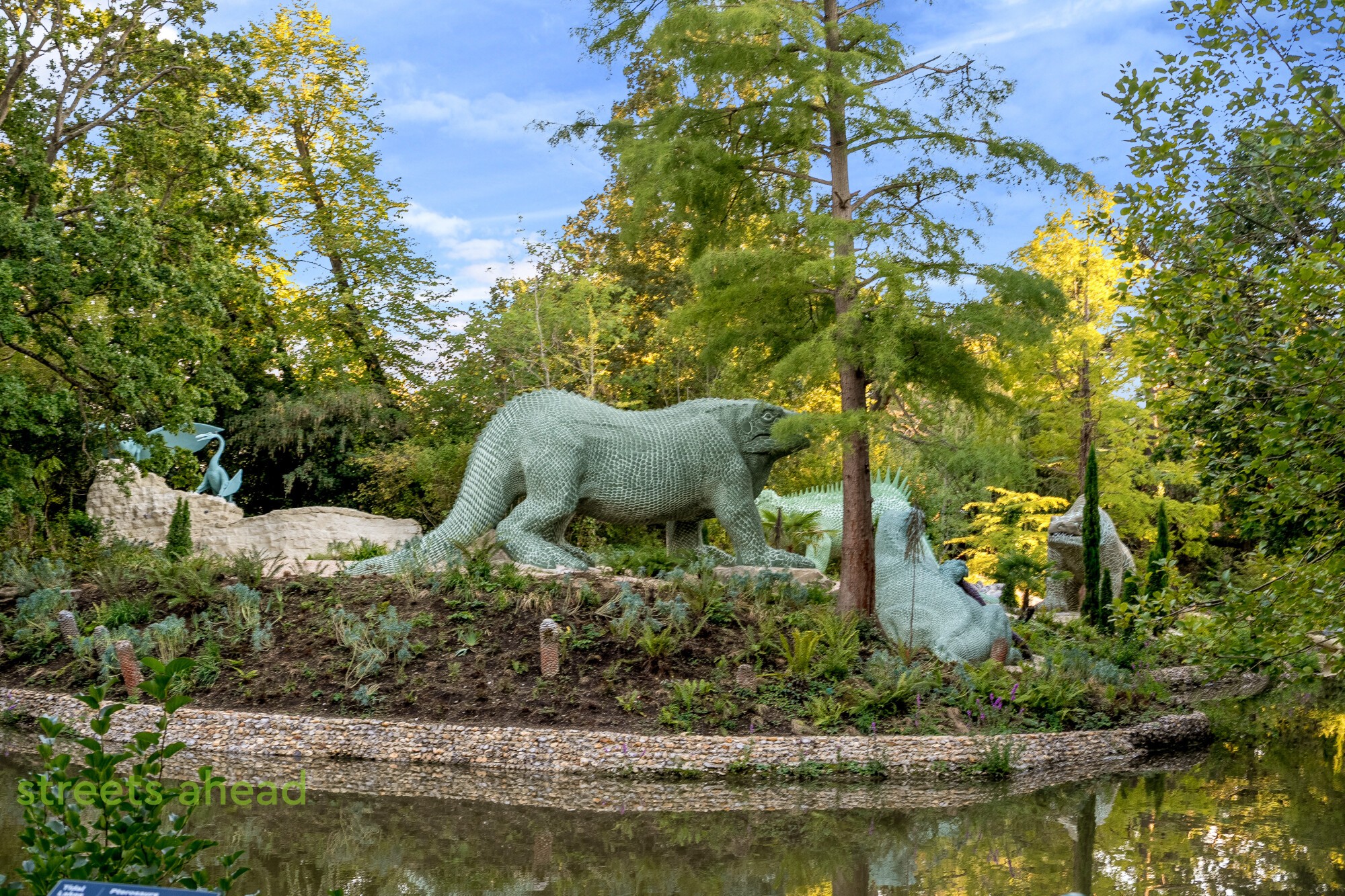 Dinosaur island viewed across the lake in Crystal Palace Park