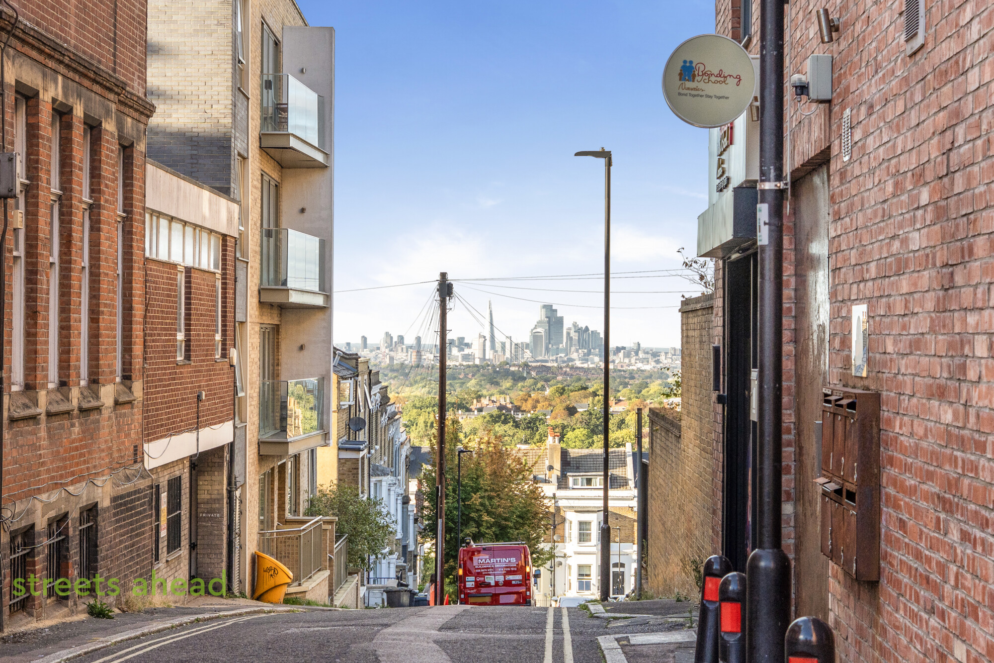 Street in Crystal Palace with a view towards the City of London skyline